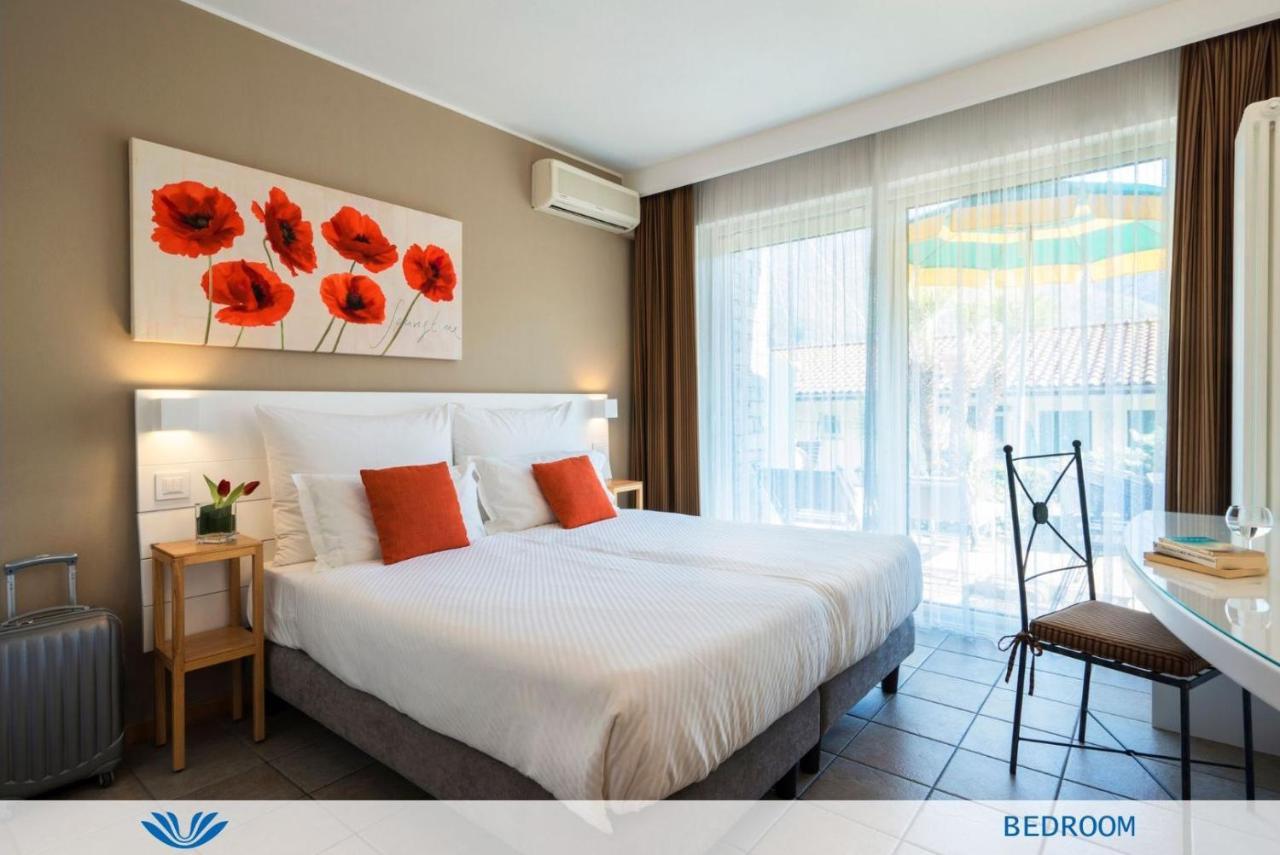 Parco San Marco Lifestyle Beach Resort Porlezza Bagian luar foto